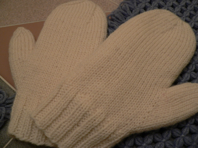 These are 100% wool knit mittens, lined with fleece fabric.